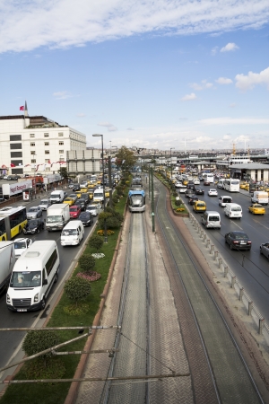 ISTANBUL, AUG 31, 2013: City Tram and heavy traffic jam circa Eminonu, Huge number of stopped cars in line during rush hour. on August 31, 2013 in Istanbul, Turkey.のeditorial素材
