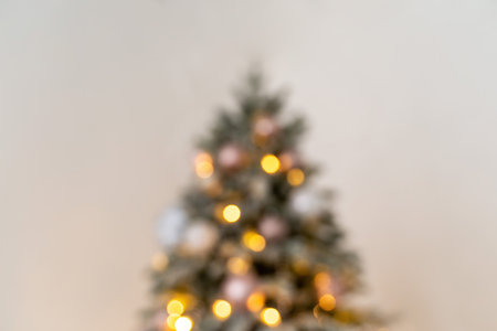 Decorated Christmas tree upside down in blur