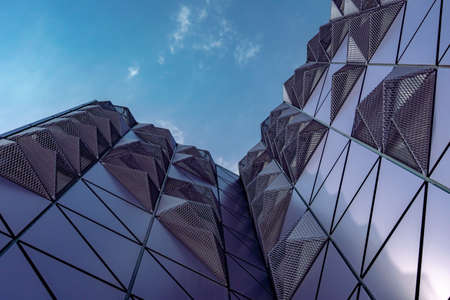 Abstract reflection of modern city facades. Modern office building detail.の写真素材
