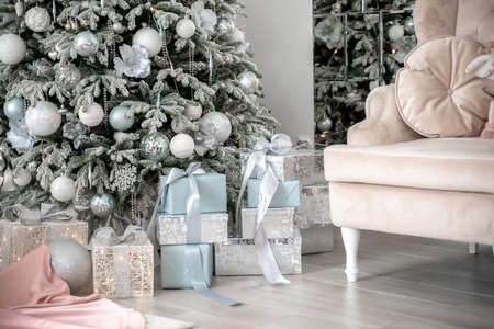 Presents and Gifts under Christmas Tree, Winter Holiday Conceptの写真素材