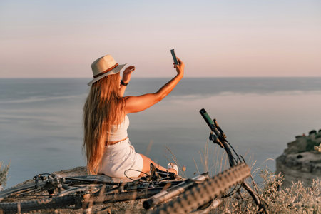 Selfie woman in cap and tank top making selfie shot mobile phone post photo social network outdoors...