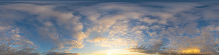 Panorama of a dark blue sunset sky with golden Cumulus clouds. Seamless hdr 360 panorama in...