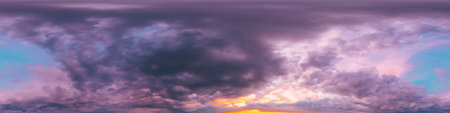Dramatic sunset sky panorama with bright glowing red pink Cumulus clouds. HDR 360 seamless spherical...