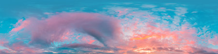 Sunset sky panorama with bright glowing pink Cirrus clouds. HDR 360 seamless spherical panorama. Full zenith or sky dome in 3D, sky replacement for aerial drone panoramas. Climate and weather change.の写真素材
