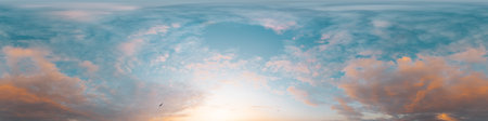 Sunset sky panorama with bright glowing pink Cumulus clouds. HDR 360 seamless spherical panorama....