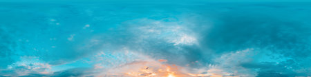 Sunset sky panorama with bright glowing pink Cirrus clouds. HDR 360 seamless spherical panorama. Full zenith or sky dome in 3D, sky replacement for aerial drone panoramas. Climate and weather change.の写真素材