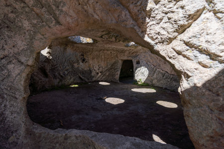 Ancient cave city. Inside the cave, view from the window.の写真素材