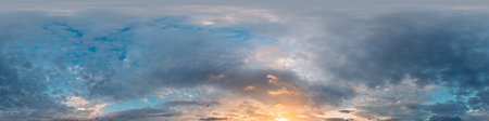 Sunset sky panorama with bright glowing pink Cirrus clouds. HDR 360 seamless spherical panorama....