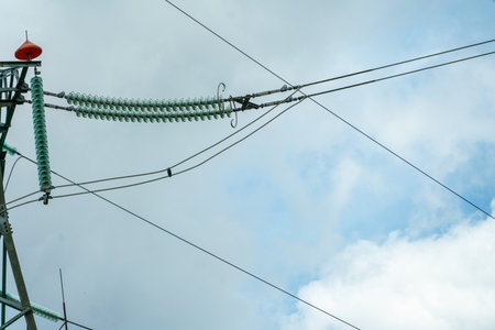 High voltage towers with sky background. Power line support with wires for electricity transmission....