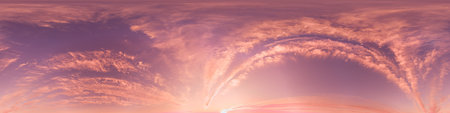 Sunset sky with bright glowing pink Cirrus clouds. Seamless spherical HDR 360 panorama. Full zenith...