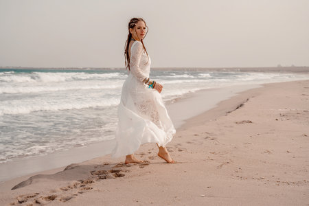 Woman lying in bath foam at bathroom. Romantic girl relaxing at bathtub at home. Close up sexy woman taking bath indoors.の写真素材