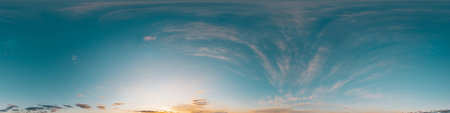 Sunset sky with bright glowing pink Cirrus clouds. Seamless spherical HDR 360 panorama. Full zenith or sky dome in 3D, sky replacement for aerial drone panoramas. Climate and weather change.の写真素材