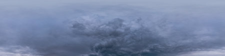 Dark moody rain clouds in dramatic overcast sky. Seamless 360 HDR spherical panorama. Full zenith or sky dome in 3D environment, sky replacement for aerial drone panoramas. Climate and weather change.の写真素材