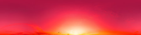 Golden glowing red orange overcast sunset sky 360 hdr panorama. Seamless spherical equirectangular panorama. Sky dome or zenith for 3D visualization and sky replacement for aerial drone 360 panoramas.の写真素材