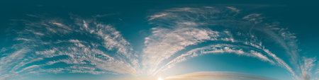 Sunset sky with bright glowing pink Cirrus clouds. Seamless spherical HDR 360 panorama. Full zenith or sky dome in 3D, sky replacement for aerial drone panoramas. Climate and weather change.の写真素材