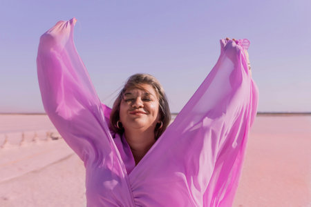 Woman Pink Dress Salt Lake Joyful Expressionの写真素材