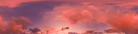 Seamless 360 HDR spherical panorama of sunset sky with vibrant pink Cumulus clouds. Full zenith or...