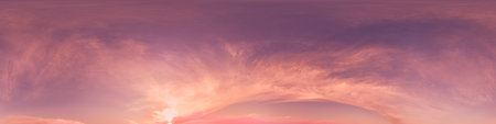 360 panorama of glowing sunset sky with bright pink Cumulus clouds. HDR 360 seamless spherical...