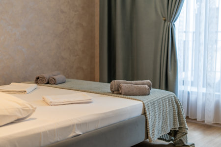 Bedroom Towels Bed Linen Hotel Room: Cozy Guest Accommodation Ready for Arrivalの写真素材