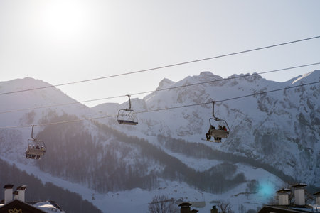 Ski Lift, Mountains, Winter: Sunny Day Alpine Cable Car Transportationの写真素材