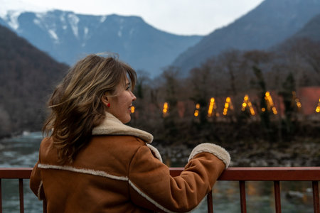 Woman Mountains Bridge: Caucasian autumnal landscape, enjoying view, Dombay resort.