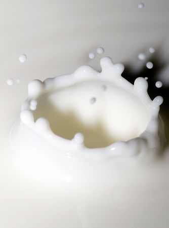 milk cup formed at falling a dropの写真素材