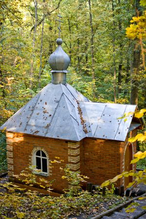 Small chapel in a woodの写真素材
