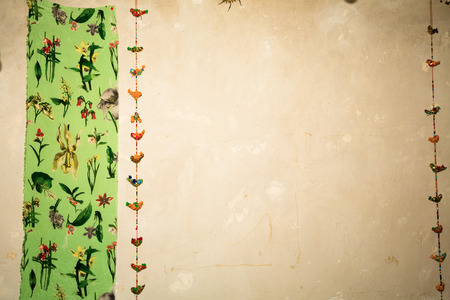 grungy green background with flowers and birdsの写真素材