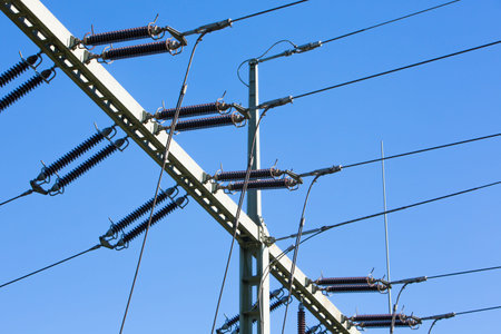 power lines in front of blue sky