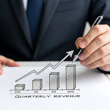 businessman drawing a graph showing growth in the form of a chartの素材