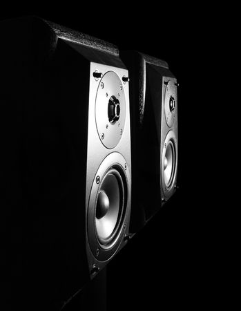 Two hi-fi loudspeakers on the black background.の写真素材