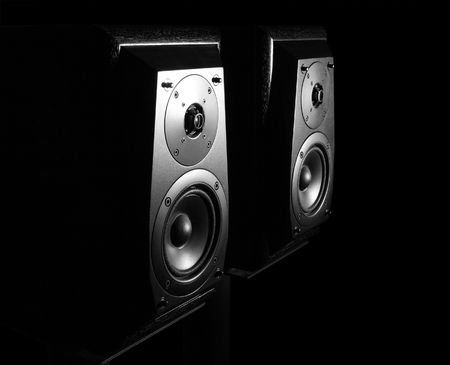 Two hi-fi loudspeakers on the black background.の写真素材