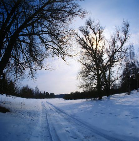 Winter road and blue sky. の写真素材