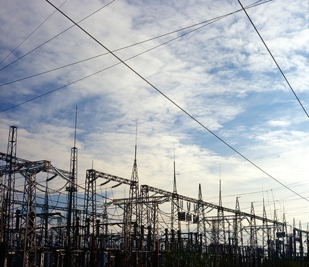 Wires mounted on steel frame at power substation.の写真素材