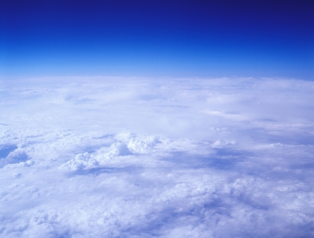Clouds from above, taken from an airplane.の写真素材