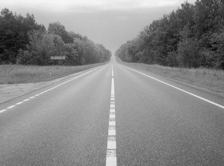 Empty country highway in black and white 