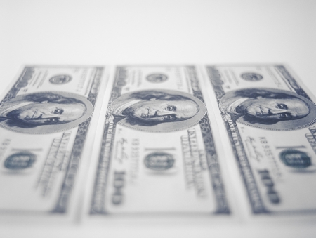 American one hundred dollar bills on white background の写真素材