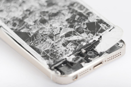 Touch screen mobile phone with broken screen の写真素材