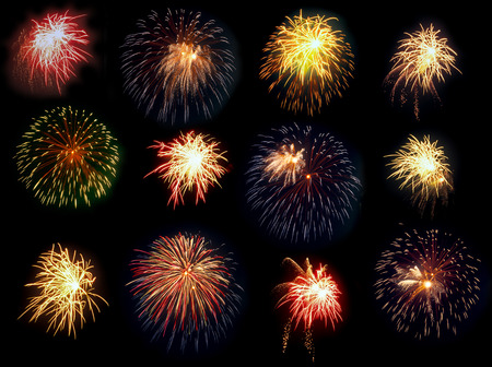 Single bursts of fireworks on black background.の写真素材