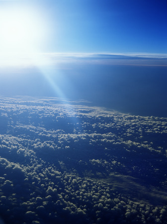 Aerial view of clouds from aircraft window.の写真素材