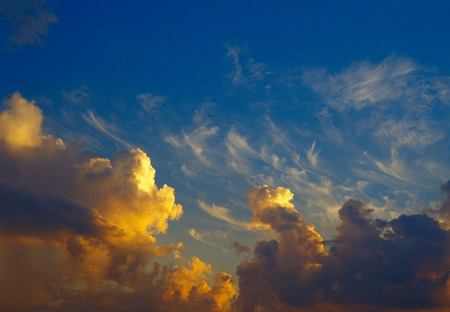 Beautiful orange clouds against a blue sky.の写真素材