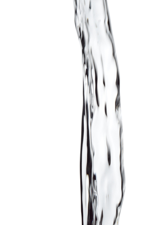 Stream of flowing water isolated on white background.の写真素材