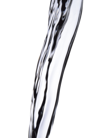 Stream of flowing water isolated on white background.の写真素材