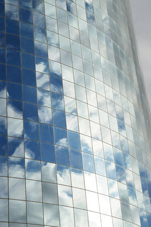 Reflections in the windows of a New York skyscraper.の写真素材