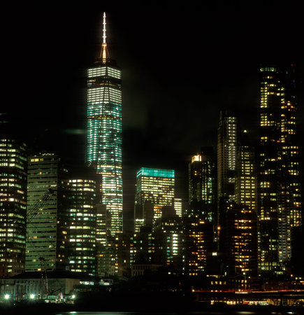 Lower Manhattan with Freedom Tower at night.