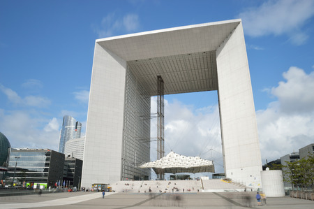 Paris, France - September 12, 2017: La Grande Arche against a blue sky, taken with long exposure.のeditorial素材