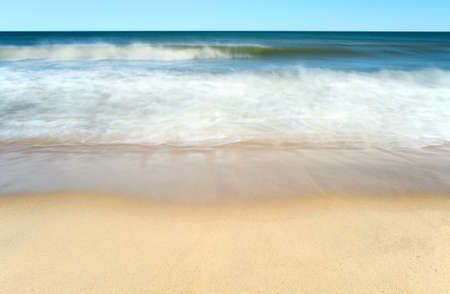 Waves on the beach taken with long exposure. Long Island, NY.の写真素材
