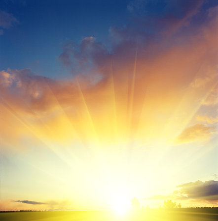 Beautiful sunset over a dark landscape.の写真素材