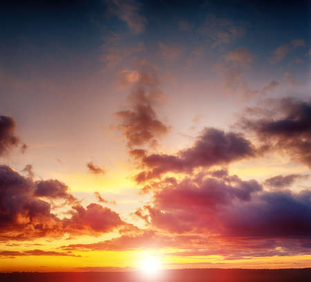 Beautiful sunset over a dark landscape.の写真素材