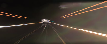 High speed train driving along the rails through a tunnel.の写真素材